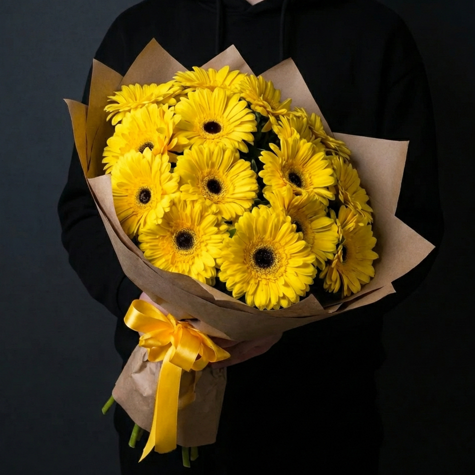 15 желтых гербер в крафте